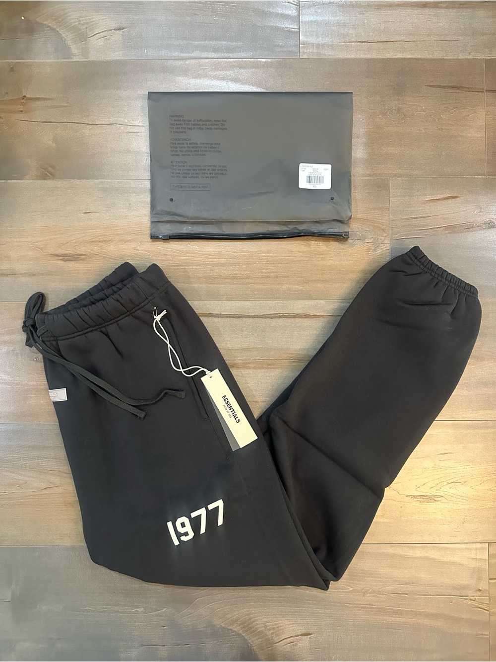 Essentials Black Sweatpants with White 1977 Logo